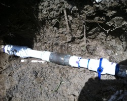 new pipe with new shut off and back flow preventer .